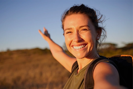 Pain Free Woman In Nature During Golden Hour
