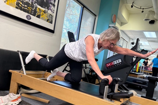 Physical Therapy Thousand Oaks CA Patient Doing Stretch Patient Doing Stretch On Rehab Machine