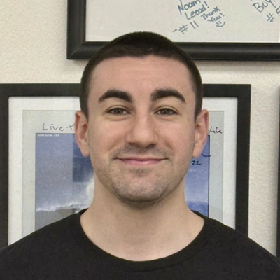 A headshot of Vince Agredano, a Rehabilitation Aid at Omega Rehab & Sport